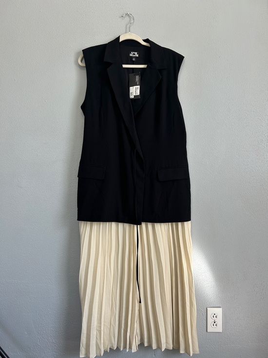 Future Collective Dresses & Skirts - NWT Beautiful Sleeveless pleated skirt Midi-A Line Dress by Future Collective.